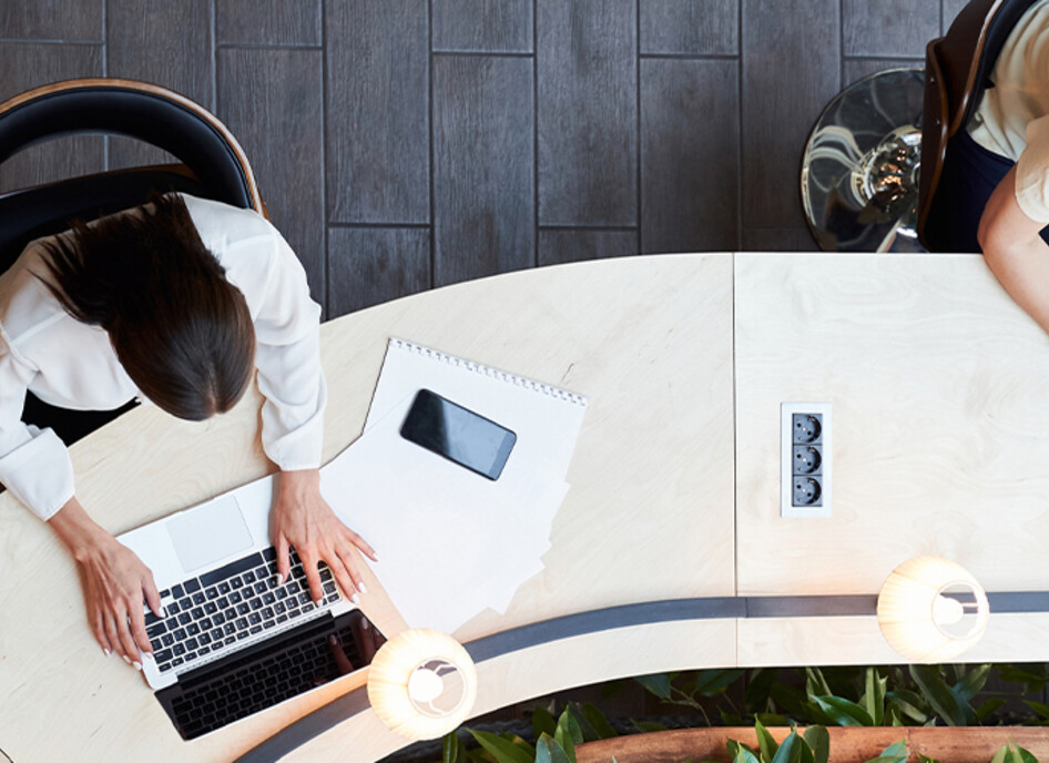 People working with Wi-Fi connected devices