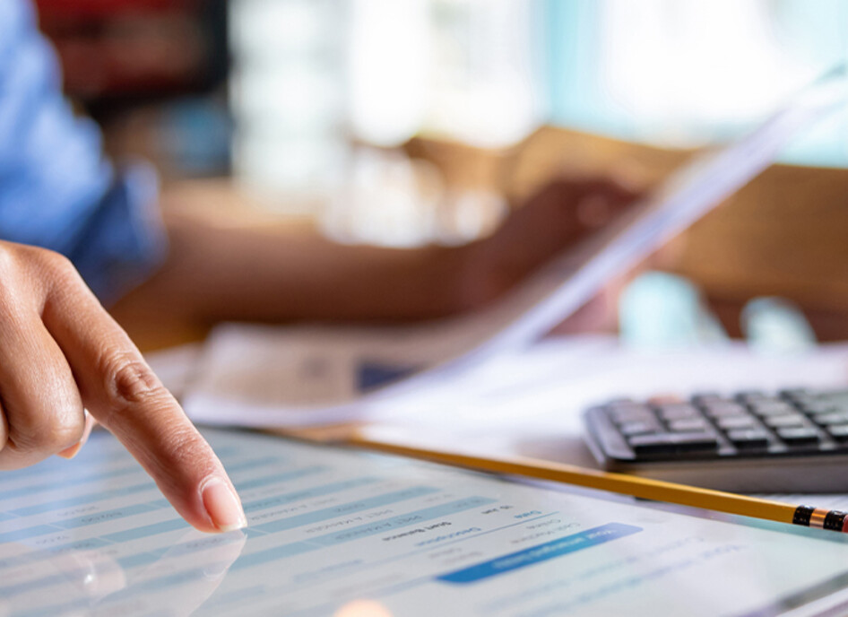 Person calculating business expenses