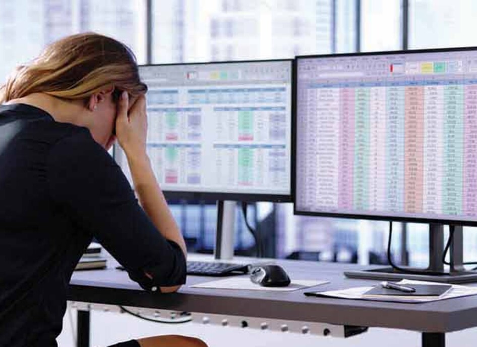 Person working on spreadsheet