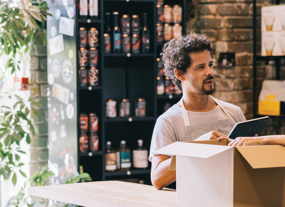 Small business owners working together in a shop