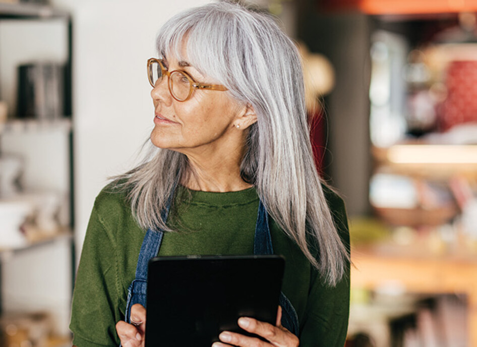 small business owner on tablet