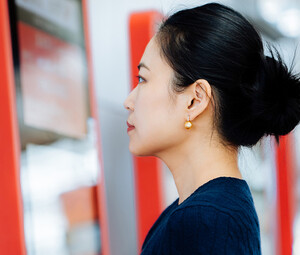 Person using touchscreen kiosk